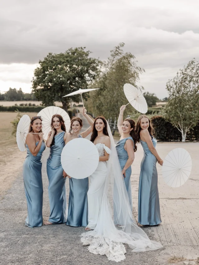 Get @reshare_app • @_laurenmayphotography Lauren + her girls 🤍

A little bit of blue, a whole lot of laughter, and a few parasols for good measure ✨

Because your bridesmaids aren’t just there for the photos — they’re the girls who have been there through it all, and somehow make one of the biggest days of your life even more fun.

Photographer  @_laurenmayphotography 
Venue @strattoncourtbarn 
Jewellery - @Swarovski
Hair - @linzi.loops
Make up - @byrhiannamae
Dress -  @whiteboutique29 Brand - Enzoani
Florist - @theflowerboutiquemk
Entertainers - @DJSAXSPIN
Venue decor - @theflowerboutiquemk
- somethingborrowed
Suits - @Marc Darcy
Content Creator - @foreverreelcontent
Spray Tan - mp_spray_tan_coventry
