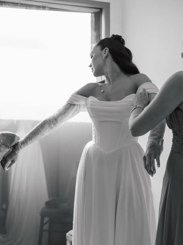 G E O R G I A 

Gosh Georgia we love youuuu!!! Obsessed with all of these beautiful moments!! Wearing @mikaellabridal 

Beautifully captured by @amyrosedeffley 

@amyrosedeffley "Georgia and James’ relationship has stood the test of time and distance, and now they live together, it’s the little details - like James putting toothpaste on Georgia’s toothbrush every night, that feel like such a lovely testament to their love.

And then there’s ‘cricketing’ - what an utterly adorable habit Georgia and James share: rubbing your own feet together as you fall asleep. I now know what cricketing is, and I bloody love it.

Georgia’s dress deserves a mention too. Those classic ballgown shapes, the V-tapered waist and lace sleeves felt a little Regency era and I absolutely adored her look. I know James was a massive fan too. Paired with her elegant half-up do and waves, she was an absolute vision.

I was completely in my creative element at their Mickleton Hills Farm wedding on Saturday. Thank you, from the bottom of my heart, both for giving me the opportunity to do this and for trusting me to capture it from the heart.

We totally lucked out with the weather. Crisp, sunny, properly autumnal. It was bloody gorgeous."

Photographer: @amyrosedeffley 
Venue: @mickletonhillsfarm 
Celebrant: @lauracrockettcelebrants 
Video: @daydreamfilms_ 
Dress: @thewhiteboutique_bridal 
Flowers: @your_cotswold_florist 
Hair: @weddinghairbysianredmond 
Makeup: @bryonydaltonmakeupartist 
Band: @redwooddrive_band 
Cake: @helens_cakery_